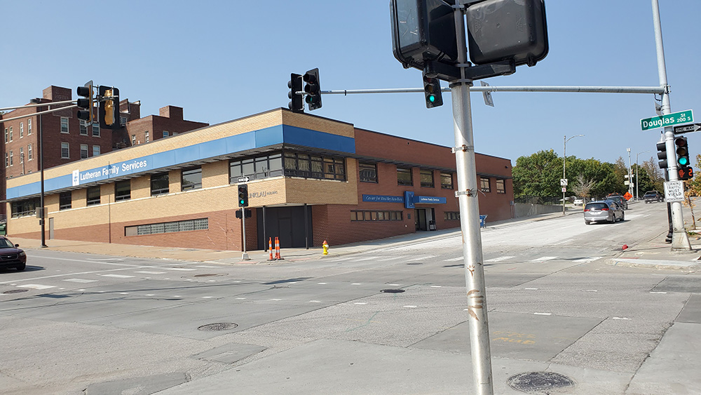 Lutheran Family Services building and traffic and pedestrian signals.